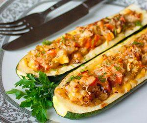 Zucchini stuffed in a slow cooker lie on a plate