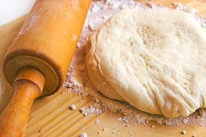 Ready-made yeast dough on the board