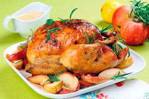 Chicken with apples decorated with greens
