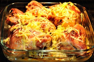 Chicken legs with cheese in the oven