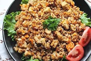 Rich buckwheat decorated with tomatoes