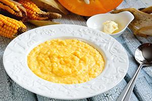 Corn and pumpkin porridge and a slice of butter