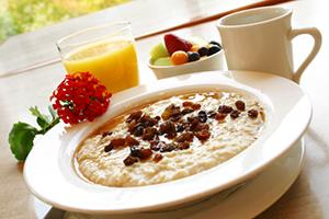 Juice, flower and oatmeal with raisins for your beloved wife