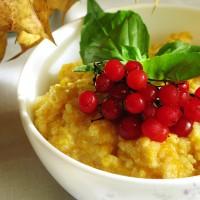 Autumn porridge with berries and pumpkin