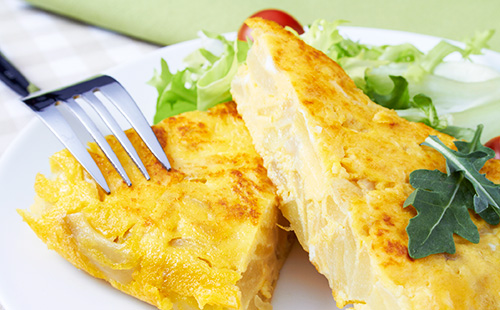 Spanish omelet with potatoes, onions and mushrooms - potato tortilla