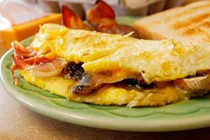 Omelet with mushrooms and bacon