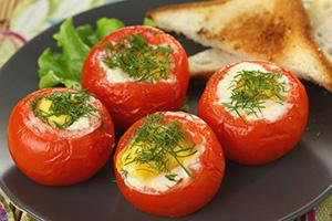 Oven baked fried eggs in tomatoes