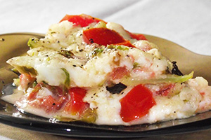 Egg-free omelet with cheese and tomatoes