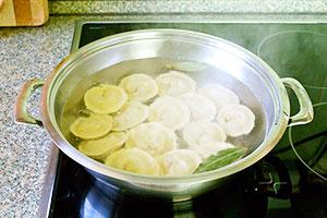 Dumplings are boiled in a pan