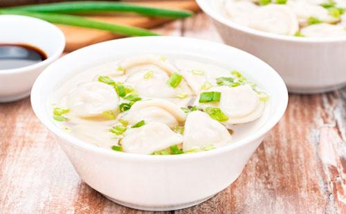 Dumplings soup with herbs
