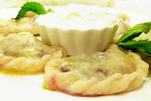 Dumplings with cherries and sour cream