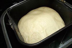 Dough in a bucket of bread maker