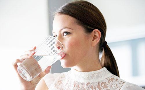 Girl drinks water