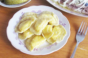 Dumplings with grated potatoes and bacon
