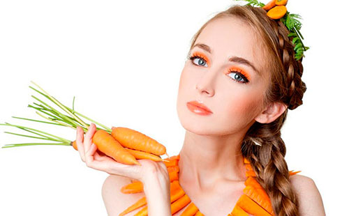 Chica con zanahorias