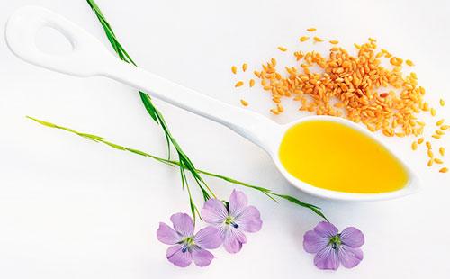 Flaxseed oil in a spoon