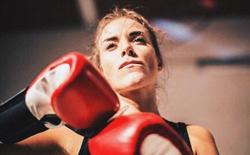 Actress in red boxing gloves