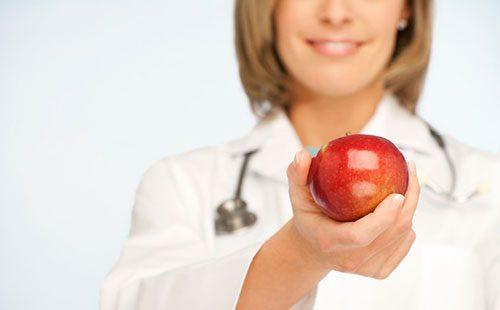 Doctor with apple