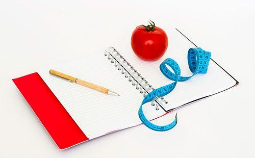 Tomato on a notebook