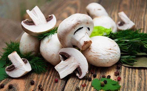 Fresh champignons with herbs and spices