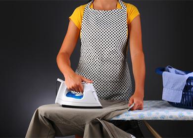 Woman ironing pants