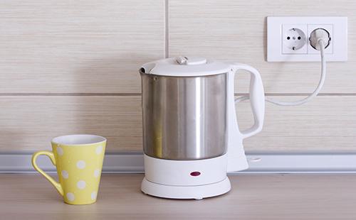 Electric kettle and yellow cup
