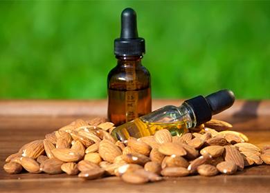 Almonds and oil in a bottle