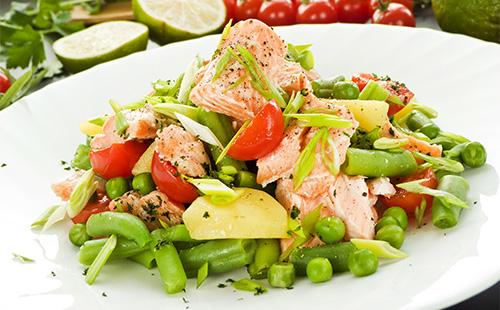 Salad with vegetables and salmon