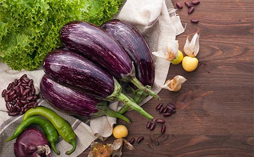 Eggplant lie on the table