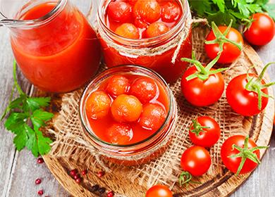 Canned tomatoes in a jar and greens