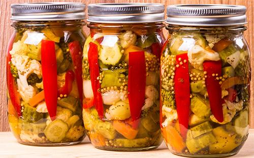 Assorted vegetables in jars