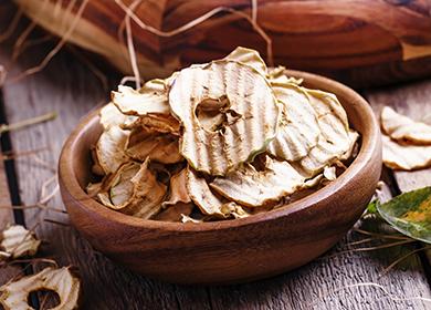 Clay bowl of dried apples