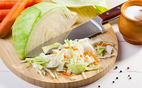 Shredded cabbage on a board