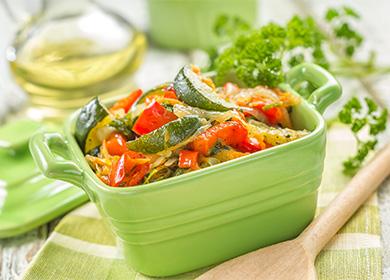 Vegetable stew in a green bowl