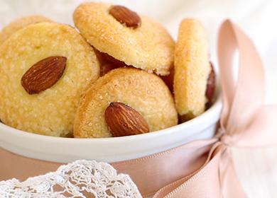 Almond cookies decorated with pink ribbon.