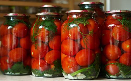 Pickled tomatoes in jars