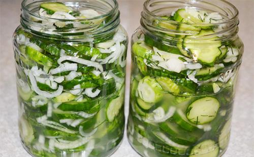 Cucumber and onion salad in jars