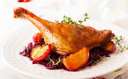 Duck leg on a plate