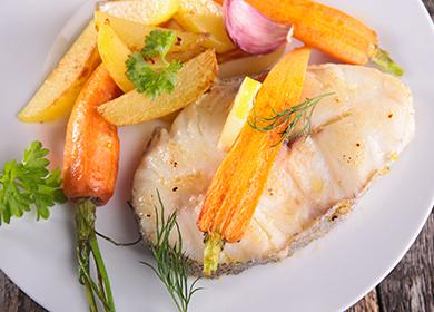 Fish with vegetables on a plate