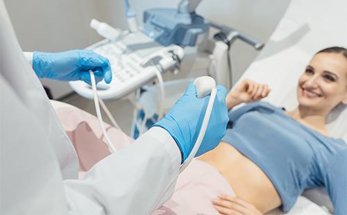 Woman undergoing ultrasound examination