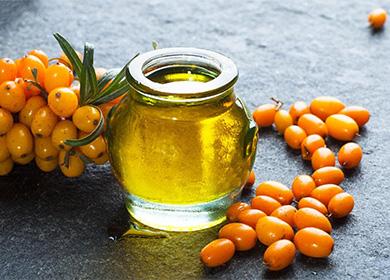 Sea buckthorn and oil in a jar