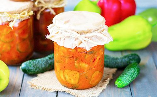 Cucumber onion in a jar on a table