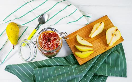 Pear jam in a jar on the table