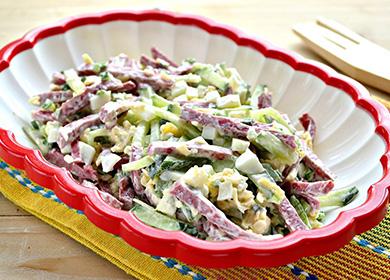 Salad with smoked sausage, corn and cabbage