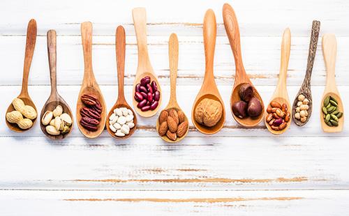 Wooden spoons with nuts