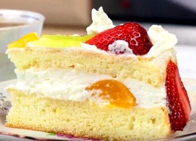 Delicious sponge cake with whipped cream and fruit.