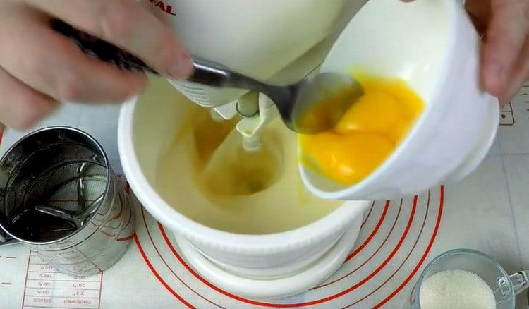 One at a time we introduce the yolks into the whipping proteins.