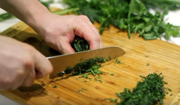 Grind fresh herbs.