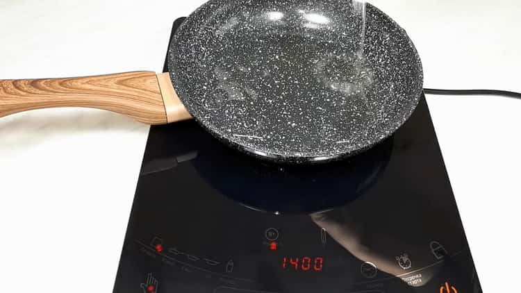 Preheat a skillet for cooking cheesecakes