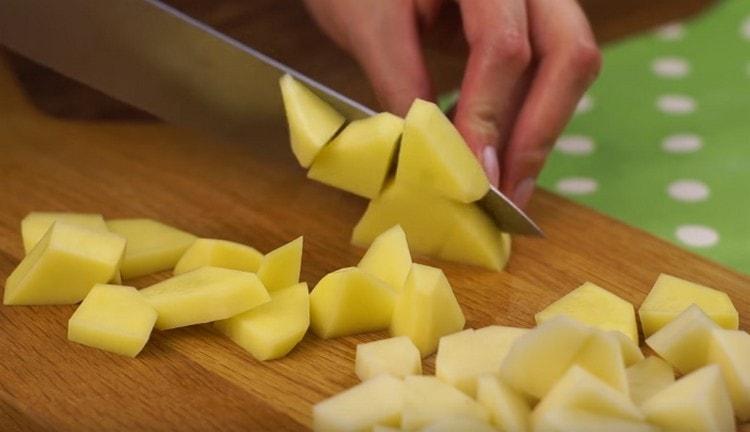 We cut potatoes into small pieces.